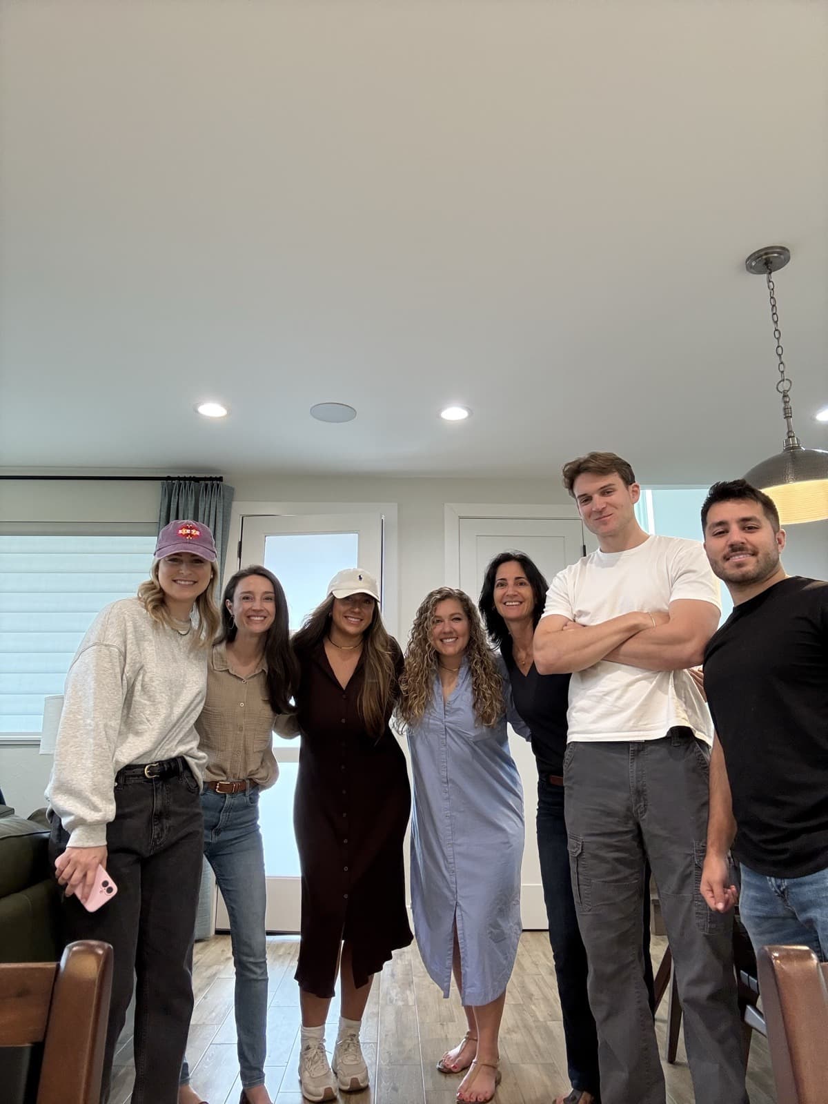 The team together inside a house